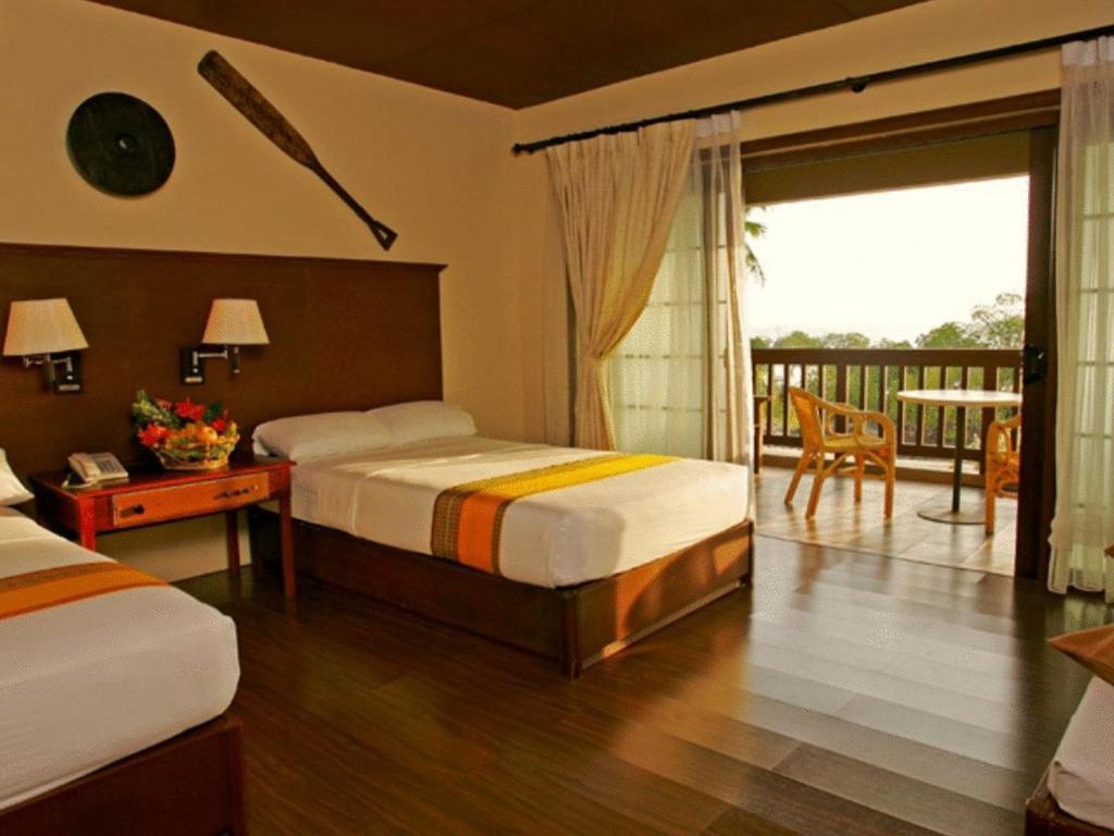 Dos Palmas Island Resort & Spa Puerto Princesa Pokoj fotografie
